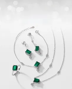 Macro shot of S925 hallmark on emerald jewelry set with rectangle cut stones