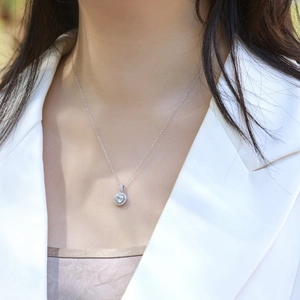 Classic 1 carat solitaire halo pendant necklace in S925 sterling silver on model