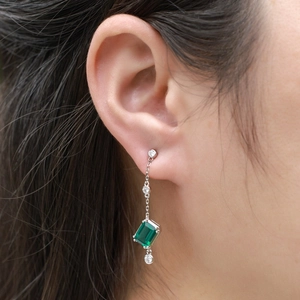 Elegant S925 silver drop earrings featuring emerald-cut green stone and zircon stones