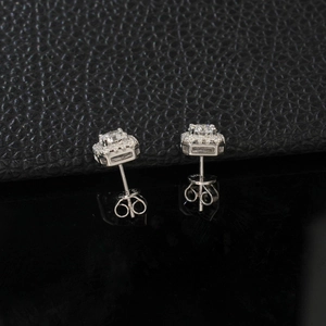 Macro view of S925 sterling silver square stud earrings with halo diamond setting