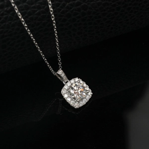 Macro view of square halo pendant with round brilliant diamond and S925 silver chain