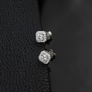 Detailed view of square S925 sterling silver stud earrings with a halo of small diamonds