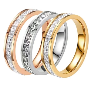 Three-piece set of minimalist stainless steel rings in gold, silver, and rose gold with zircon