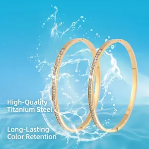 Waterproof gold titanium steel bangle for women featuring fine zircon inlay and sleek design