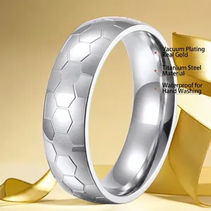 Polished silver titanium steel ring with a distinctive hexagonal honeycomb texture for men