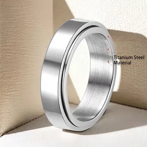 Polished silver stainless steel spinner ring with vacuum gold plating and waterproof design