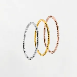 Three-piece stackable titanium steel rings in gold, silver, and rose gold finishes