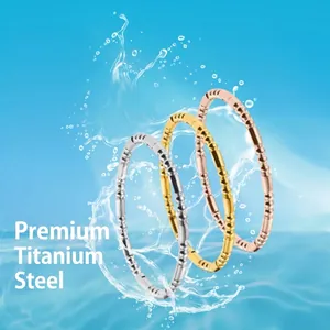 Three-piece titanium steel ring set in gold, silver, and rose gold with bamboo texture