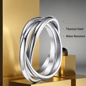 Polished stainless steel triple interlocking rolling ring with waterproof finish for women