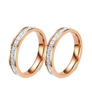 Eternity rose gold rings with square-cut cubic zirconia in a dual display setup