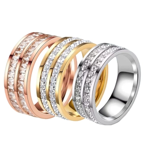 Three-piece set of stainless steel rings with square-cut cubic zirconia in gold and silver