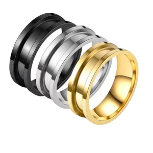 Titanium steel rings in black silver grey and gold featuring a sleek central groove design