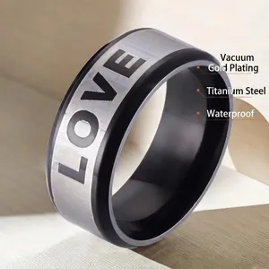 Minimalist wide titanium steel ring with silver and black tones featuring LOVE engraving