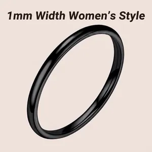 Detail of 1mm black minimalist titanium steel ring showing ultra-slim polished finish