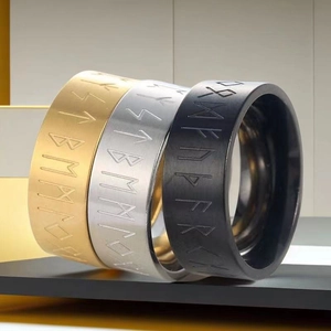 Three-color Viking rune stainless steel rings in gold, silver, and matte black finishes