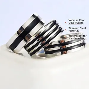 Waterproof gold-plated titanium steel rings for men featuring black enamel inlay details