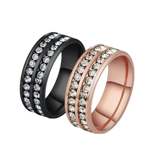 Polished stainless steel rings in black and rose gold with double row crystal pavé setting