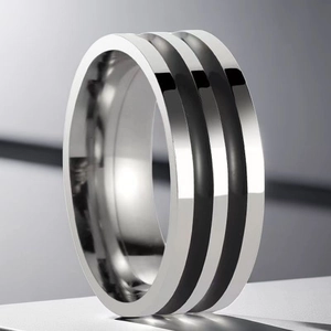 Polished silver titanium steel ring with double black grooves in a minimalist style