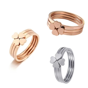 Bagues trèfle à quatre feuilles trois-en-un en acier inoxydable rose doré et argent