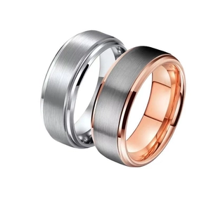 Men's titanium steel rings with brushed finish and polished rose gold edges in 45-degree view