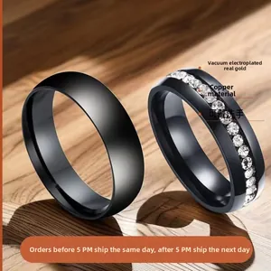 Detail of matte black stainless steel rings for men featuring a clear zircon inlay band
