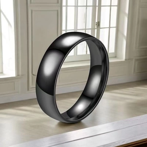 Polished black stainless steel wide band ring with a modern minimalist arc design