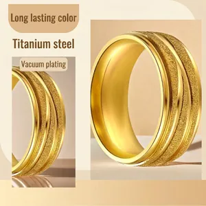 Golden titanium steel ring with sandblasted texture and long-lasting vacuum plating