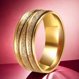 Macro detail of golden stainless steel ring featuring frosted center and polished edges