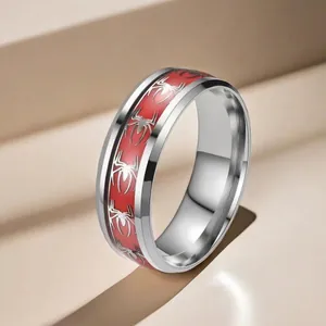 Men's titanium steel spider ring with red background and black superhero theme pattern