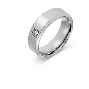 Minimalist wide band stainless steel ring with a square cut cubic zirconia stone