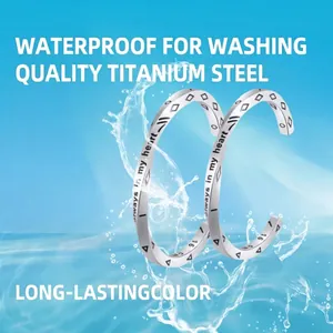 Waterproof silver titanium steel twisted bracelets with engraved geometric patterns and text