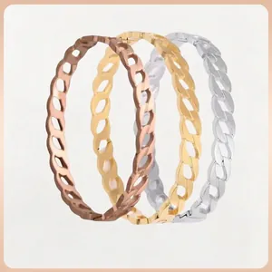 Three-color Cuban link chain rings in rose gold, gold, and silver stainless steel