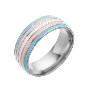 Macro shot of silver titanium ring with blue, pink and white striped enamel inlay
