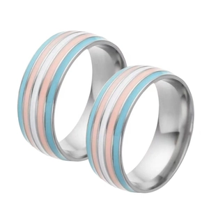 Titanium steel ring set featuring rainbow stripes of light blue, pink and white enamel