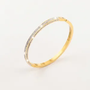 Bracelet jonc élégant en acier doré avec double rangée de cristaux étincelants