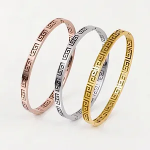 Three-piece stainless steel bangle set with vintage geometric pattern in rose gold, silver, gold
