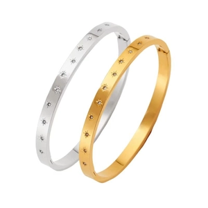Polished stainless steel eight-pointed star bangle set in gold and silver finish