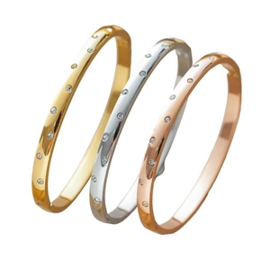 Three-piece titanium steel bangle set in gold silver and rose gold with inlaid crystals
