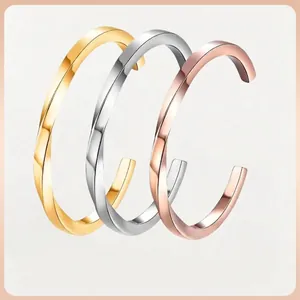 Minimalist twisted geometric open cuff bracelet set in gold, silver, and rose gold finish