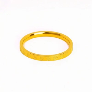 Minimalist 18k gold plated stainless steel ring featuring engraved heart patterns all around