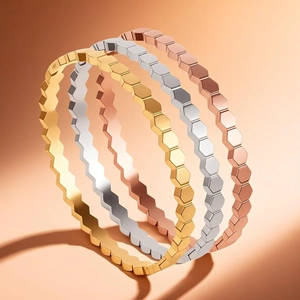 Ensemble de bracelets hexagonaux en nid d'abeille finitions or argent et rose