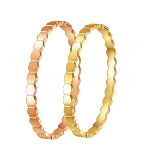 Hexagonal honeycomb titanium steel bangles in gold and rose gold plating