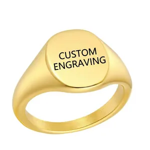 Minimalist gold-plated stainless steel signet ring with a polished oval flat top surface