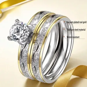 Three-in-one stainless steel ring set with a large round solitaire and paved accents