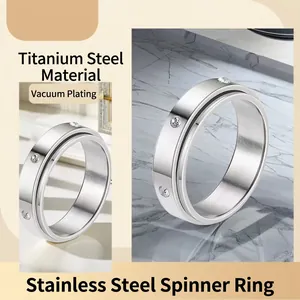 Stainless steel spinning ring for women with star moon motifs and embedded zircon stone