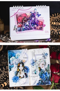Scrapbook detail showing goddess PET stickers with rose and butterfly motifs on a planner