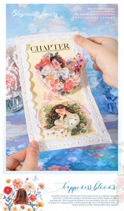 Close-up of vintage girl and flower stickers with white lace trim for DIY scrapbooking