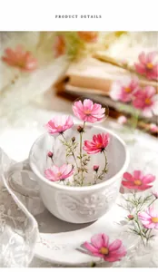 Macro view of floral PET stickers showing pink cosmos flowers on a ceramic surface