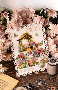Artistic detail of animal and flower PET stickers on a decorative cutout card for DIY journaling