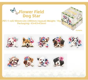 Detail of PET tape featuring cute cartoon dogs and floral patterns for scrapbooking